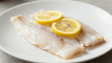 Blanquette di merlano al limone: la tecnica degli chef per una salsa cremosa senza coagulazione in 45 minuti